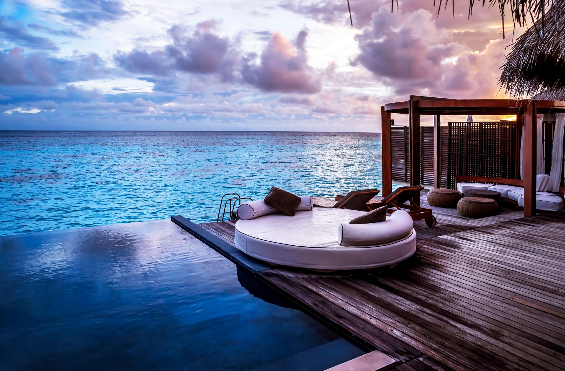 round lounge cushion on private pool deck of Caribbean villa