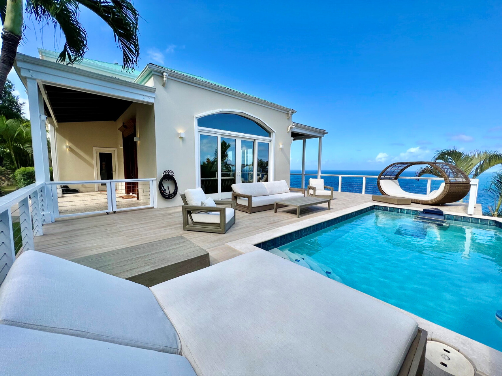 white villa in Virgin Islands private pool deck overlooking ocean